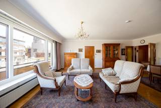 Location:
This spacious and well maintained apartment is located in beautiful Deurne Zuid, in a sought after area near Boekenbergpark and Te Boelaerpark. You will live here in a pleasant neighborhood with supermarkets, local shops, restaurants, schools, sports facilities and public transport nearby. Accessibility is also excellent thanks to the easy connection to major access roads.

Layout:
The apartment is located on the first floor of a small and well maintained building. You enter through the entrance hall with built in cloakroom and storage cupboard. The spacious living room of approximately 40 m² enjoys plenty of natural light and gives access to the front terrace. The well maintained kitchen is generously sized and includes a practical utility room with connection for a washing machine. There is also a separate storage cupboard, a separate toilet and a neat bathroom with bathtub and shower. At the rear there are 2 spacious bedrooms of approximately 15 m² each, one of which has access to the southwest facing terrace with afternoon and evening sun.
Garage: garage box optionally available for purchase at 25,000 euros.
Storage: individual basement storage room available.

Advantages:
✓ Spacious and bright apartment
✓ EPC label A
✓ Southwest facing terrace with pleasant sun orientation
✓ Bedrooms of approximately 15 m² each
✓ Small building with elevator

Technical details:
PVC windows with double glazing and shutters at the rear. Heating via renewed individual gas central heating.
Completely asbestos free. Garage box behind the building accessible via a central entrance gate with remote control and equipped with electricity and water. Elevator available in the building.

Extra:
General costs amount to 80 euros per month.
Urban planning information pending.

Curious about the value of your property? Request a free valuation via lex@bauwensvastgoed.be