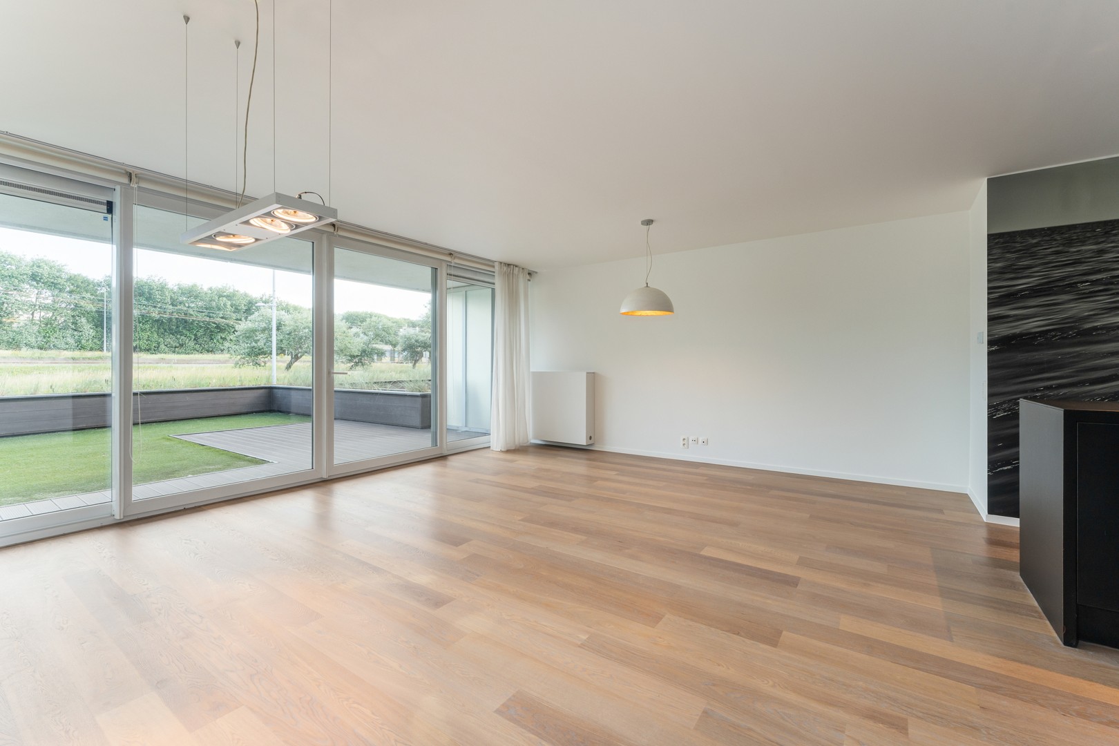 Luxueus gelijkvloers appartement met grote leefterrassen. - photo 4