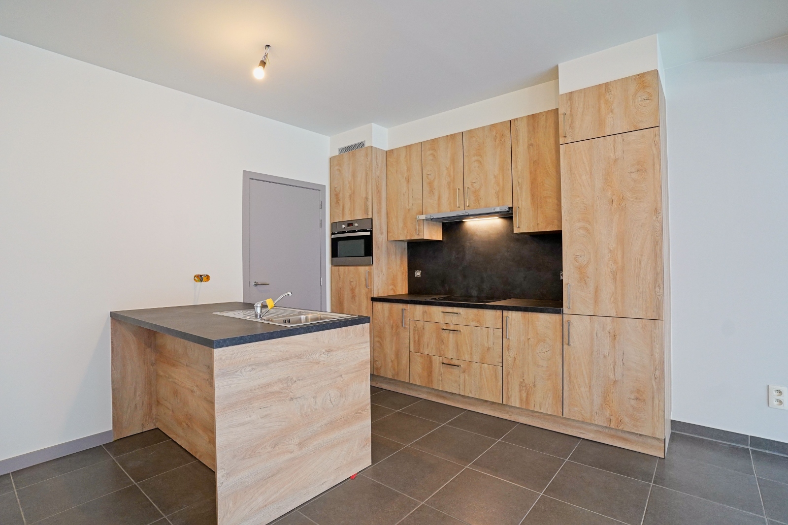 Ruim en lichtrijk appartement met 2 terrassen en parking in het centrum van Buggenhout - foto 4