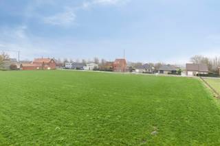 Strategically located along the Moorseelsesteenweg on the Vossemolen in Rumbeke, between house numbers 136 and 152 and near Beitem, is this subdivision with 5 spacious plots of land. The location combines easy accessibility via the N36 and E403 with the immediate vicinity of AZ Delta, Bergmolenbos, Sterrebos and the center of Rumbeke.<br /><br />LOT 1 is a plot of 1,661 m², suitable for the construction of an open building. With a street width of approximately 22 meters and a depth of approximately 86 meters, this plot offers a spacious construction area of 14 meters wide and 22 meters deep. The west-facing garden enjoys afternoon and evening sun and borders the back of an agricultural zone with a permanent open view.<br /><br />According to regulations, up to 40% of ancillary jobs linked to living are possible, ideal for the office, practice, liberal profession or services. Thanks to its location, you can enjoy optimal visibility and accessibility.<br /><br />In addition, the following lots are available in this subdivision: LOT 2 of 1,698 m², LOT 3 of 1,674 m², LOT 4 of 1,649 m² and LOT 5 of 2,176 m².<br /><br />A unique opportunity to build in a spacious and future-oriented way at a strategic location. You will soon be living here easily accessible and with a permanently open feeling thanks to the unobstructed rear view.<br /><br />The property is offered through the Power-sale formula. On 29/09/2026 between 17:00 and 18:00, you can come visit the building land by appointment and make an offer. The listed price is a starting price. For further information, please contact the property agent.