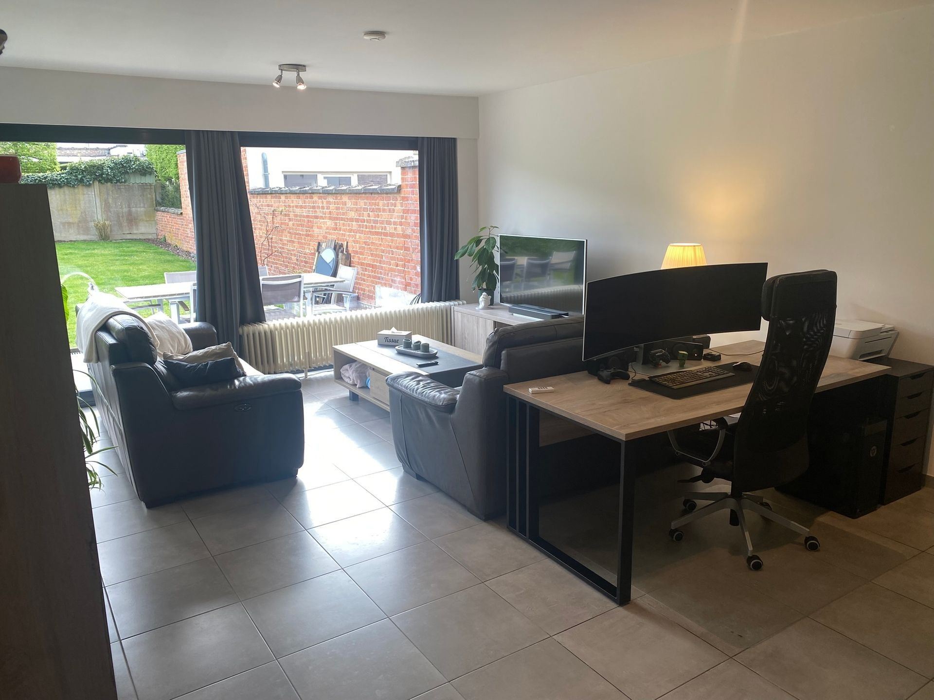 Gelijkvloersappartement met garage en tuin - foto 3