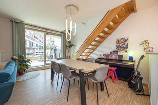 Looking for a move-in-ready duplex apartment with abundant natural light, character, and a prime location? This stylish apartment in Residence "Nieuwe Kade" (built in 2017) is ideally situated near Eilandje and Park Spoor Noord, combining a well-designed layout with high-quality finishes.<br />The first floor features an entrance hall with a guest toilet and storage room, a bright living area with a fully equipped open-plan kitchen, and access to the spacious south-facing terrace (26 m²) fitted with a sun awning. Warm parquet flooring extends throughout the entire apartment. The staircase is illuminated by a large window and enhanced by a unique suspended net, creating a cozy relaxation area.<br />The second floor offers two spacious bedrooms with built-in wardrobes, a stylish bathroom with a walk-in shower and double washbasin, a second separate toilet, and a second south-facing terrace (8 m²), accessible from both bedrooms.<br /><br />Key features:<br />Energy-efficient (EPC A) and compliant electrical installation<br />Two south-facing terraces (26 m² & 8 m²)<br />Lift, video intercom, individual gas heating, and Renson ventilation system<br />Bicycle storage and underground parking space<br />Low communal charges<br />Within walking distance of Park Spoor Noord, the MAS Museum, shops, and restaurants<br />The underground parking space must be purchased separately for €30,000.<br /><br />The floor plan, EPC certificate, and electrical inspection report are available on the Wellimmo website under "Documents".<br /><br />Interested? Contact us at info@wellimmo.net or call +32 3 225 00 68.