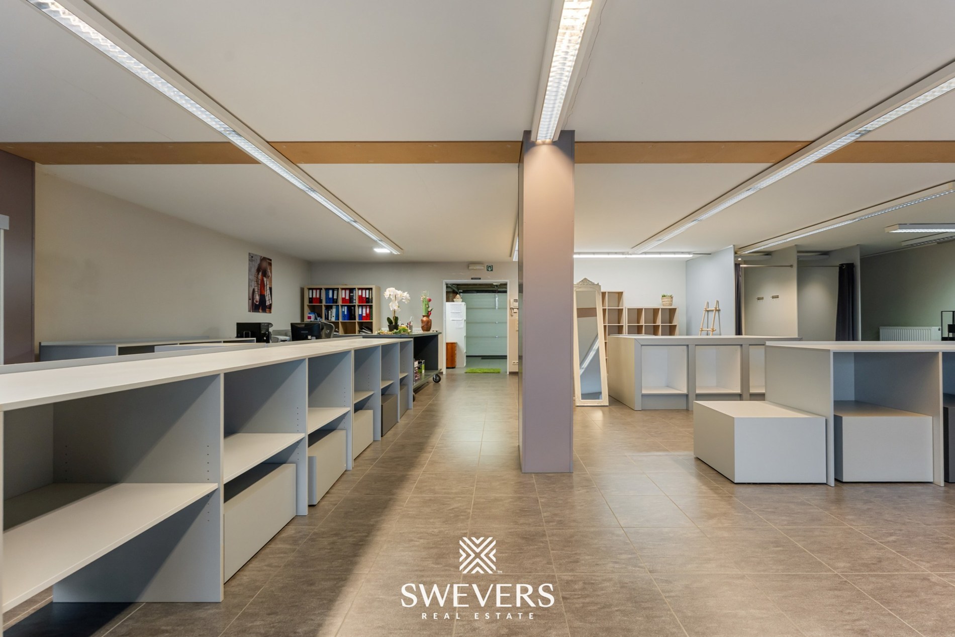 Opbrengsteigendom met handelspand, ruim appartement en uitbreidingspotentieel in hartje Heusden-Zolder - foto 5