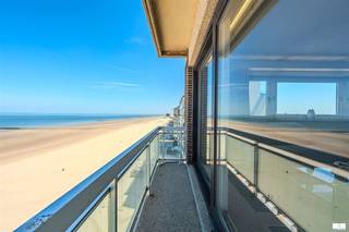 Welcome to this beautiful apartment located in the popular seaside resort of Middelkerke, right on the beach. This modern furnished property offers an ideal combination of comfort and sea view.The apartment features a spacious, bright living room and kitchen area with panoramic windows overlooking the sand and sea. The open kitchen is equipped with all necessary appliances and offers a modern workspace. The cozy sitting area invites you to relax and enjoy the sea view.This apartment features several bedrooms, some of which are elegantly furnished with practical storage space and a pleasant living atmosphere. One of them can accommodate two people or can be used as a children's bedroom, while an individual sleeping area is also available. The bedrooms have side views of the beautiful protected nature reserve of Middelkerke.A well-kept bathroom with bathtub and washbasin completes the sanitary facilities. The interior is kept neutral and equipped with good quality finishes.A particular plus point is the impressive balcony located directly on the sea. This is an ideal place to enjoy the sea breeze and the view and lives perfectly for relaxation.Additional benefits include a spacious basement storage room with the apartment, a bike rack in the building and the possibility to purchase a closed garage box in the building for an additional 80,000 euros.Its location directly on the popular sandy beach of Middelkerke makes it a real pearl for sea and nature lovers.
