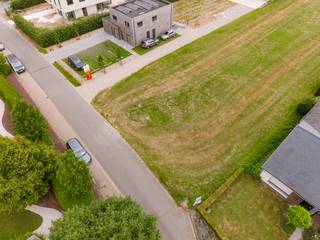 <p><strong>Unique Building Plot of 2,690 m² – Gentstraat 14, Zilverberg (Roeselare)</strong></p>
<p>Are you looking for a spacious plot where living and running a business can be combined? This exceptional building plot in Zilverberg (Roeselare) offers a rare opportunity.</p>
<p>With a surface area of <strong>2,690 m²</strong>, a street frontage of over <strong>24 metres</strong> and a depth of approximately <strong>112 metres</strong>, this property offers numerous possibilities. The rear of the plot borders woodland, providing permanent green views, maximum privacy and the guarantee that no further development can take place behind the property.</p>
<p>The plot is located next to the centre of Zilverberg, just <strong>1 km from the centre of Roeselare</strong>, with excellent access to the <strong>N32, N36 and E403</strong>. Shops, schools, public transport and other amenities are all nearby.</p>
<p>The zoning regulations allow, among others:<br />• a detached single-family home;<br />• a home with an administrative business office;<br />• a home combined with a para-agricultural activity (such as a veterinary practice, pet grooming salon, speech therapist, psychologist, laboratory or landscape architect);<br />• a home with a warehouse or hangar;<br />• a standalone warehouse or hangar, even without a residential building.</p>
<p>The generous plot size allows for the construction of a large warehouse or hangar for storage, workshop space, vehicle parking, animal keeping or commercial, artisanal and industrial activities. The business does not need to be agriculture-related.</p>
<p>Suitable for, among others, a garage, earthmoving contractor, landscaping company, machinery repair workshop, dog boarding facility, livestock trader or many other business activities.</p>
<p><strong>Key features</strong><br />✔ 2,690 m² building plot<br />✔ Street frontage over 24 m – depth approx. 112 m<br />✔ Woodland at the rear<br />✔ Ideal for combining living and business<br />✔ Wide range of development possibilities<br />✔ Excellent accessibility<br />✔ Only 1 km from the centre of Roeselare</p>
<p>A plot with this size, zoning and flexibility is exceptionally rare and offers a unique opportunity for both private buyers and entrepreneurs.</p>
<p>For more information or to arrange a viewing, please contact Simon on <strong>+32 498 123 708</strong> or by email at <strong>simon@vicusvastgoed.be</strong>.</p>