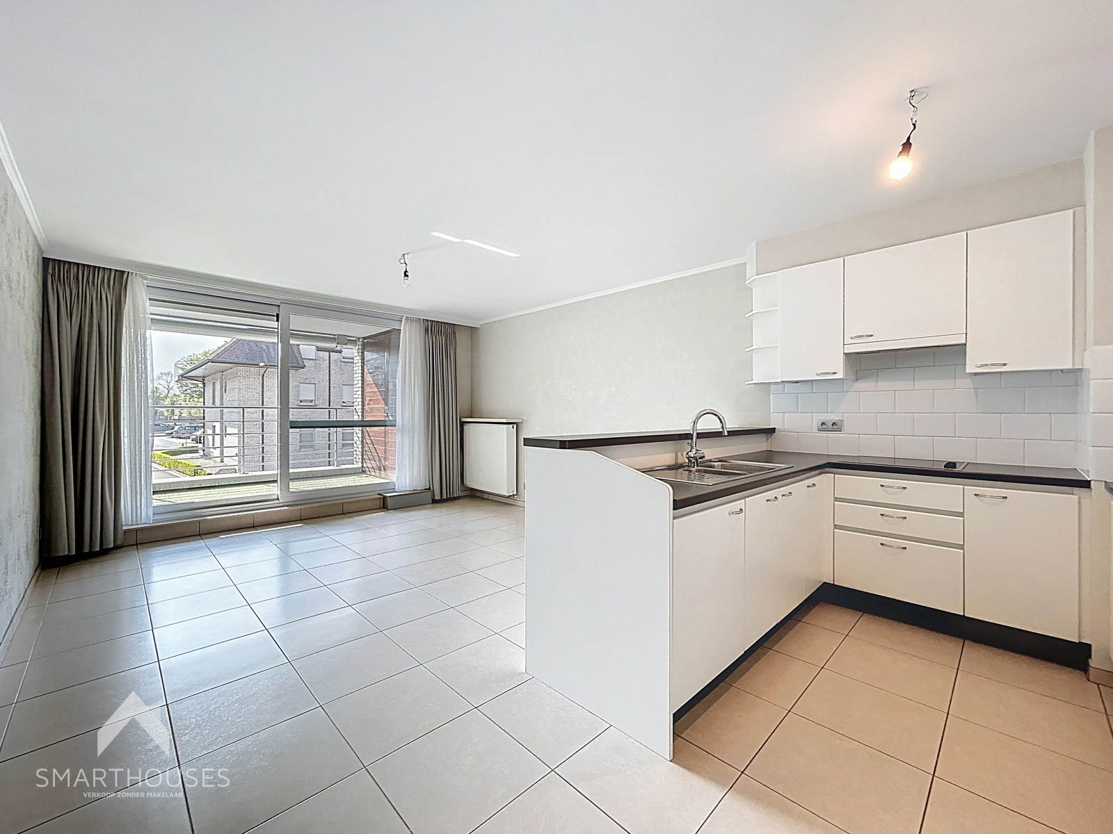 Instapklaar appartement met 2 slaapkamers, terras en garage - foto 4