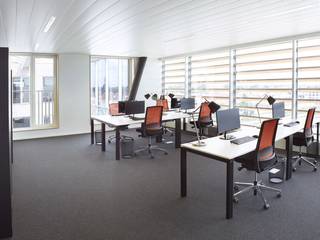 Magnificently located ALL-IN office space of 24 m², suitable for 4 to 6 workplaces, with breathtaking views over Ghent. These offices are located on the 6th floor of an iconic office building, which is part of a professional business centre. The property enjoys an absolutely prime location along the R40, right next to Ghent-Dampoort railway station, making it very accessible by both car and public transport.<br /><br />The offices are fully equipped and furnished, including spacious work tables, ergonomic work chairs and practical filing cabinets.<br />The building itself exudes class and offers numerous extras, including modern meeting rooms that meet all contemporary requirements, a professional trilingual reception service that welcomes you and your guests, and a cosy Starbucks and Nespresso corner where you can enjoy a delicious coffee break. Moreover, there are underground parking facilities, which is a great advantage in the busy city of Ghent. This office space is available immediately and offers everything you need for a smooth and professional working day.<br /><br />For more information, plans or a no-obligation visit, please contact PANORAMA B2B GENT KANTOREN on 09 225 09 02. Don't miss this opportunity to work in a unique location with a fantastic view and extensive facilities that will contribute to your productivity and comfort.