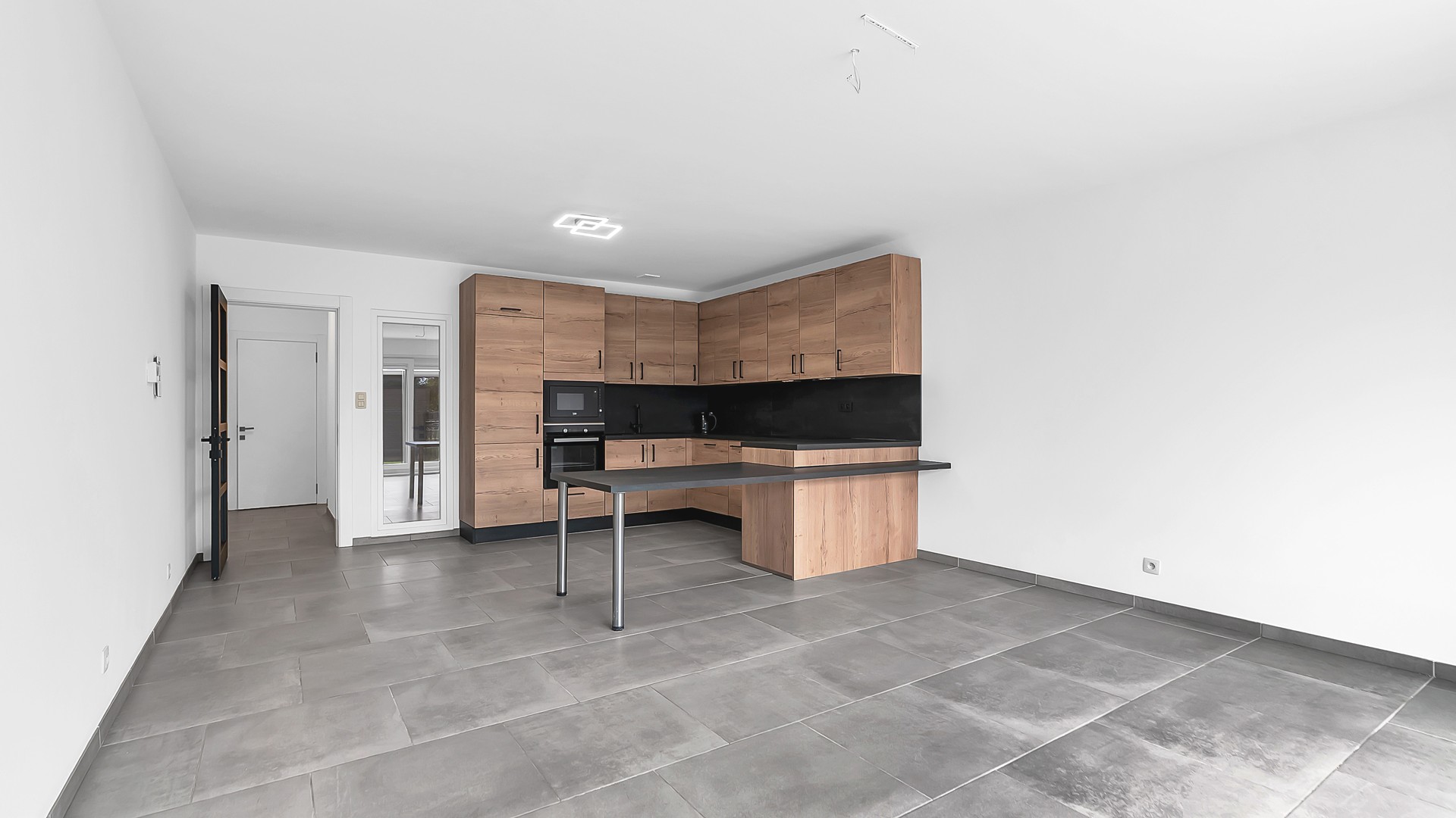 Gelijkvloers appartement met privatieve tuin, volledige onderkelderd en uitzonderlijk gunstig EPC - foto 4