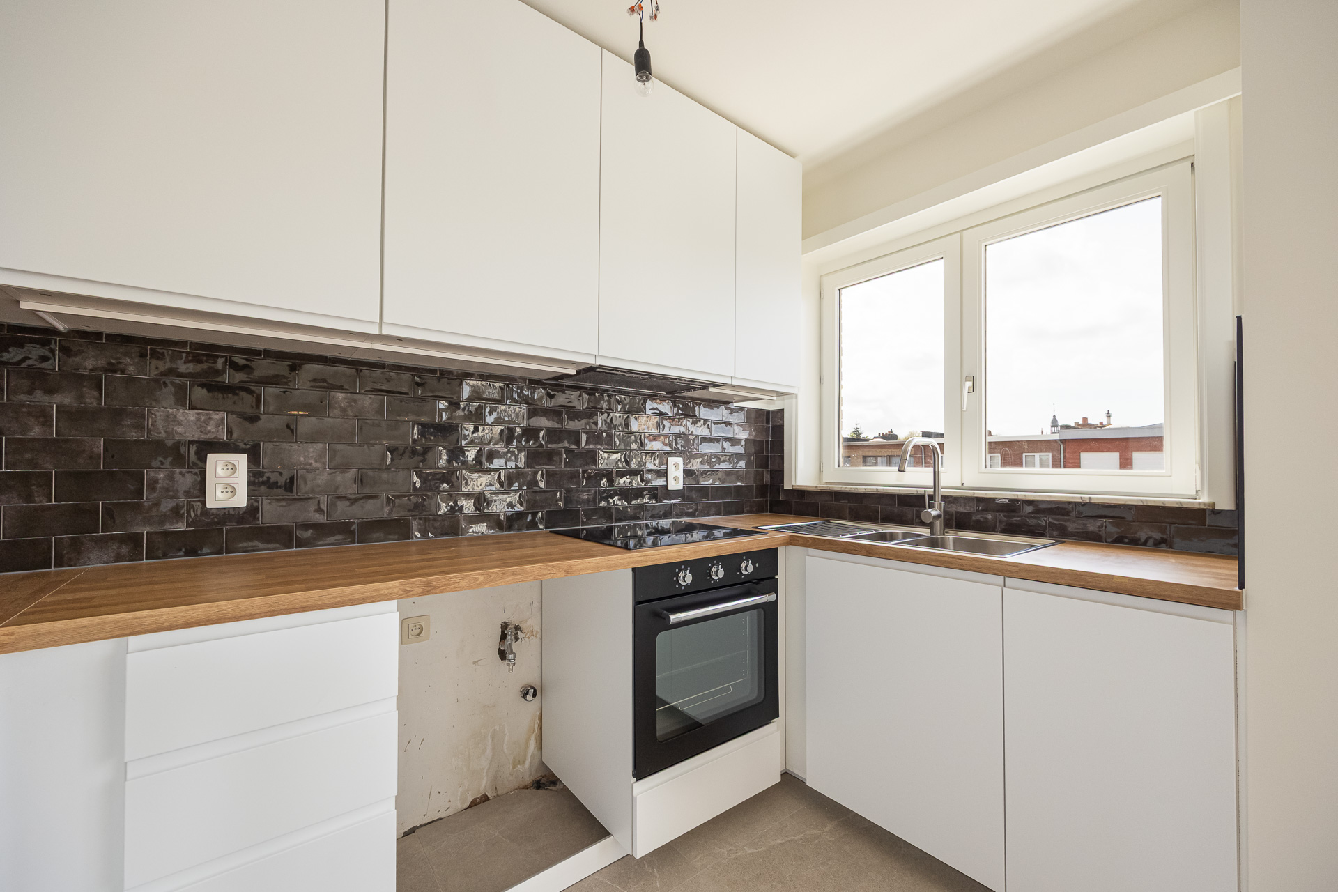 Prachtig gerenoveerd appartement met 2 slaapkamers. - foto 3