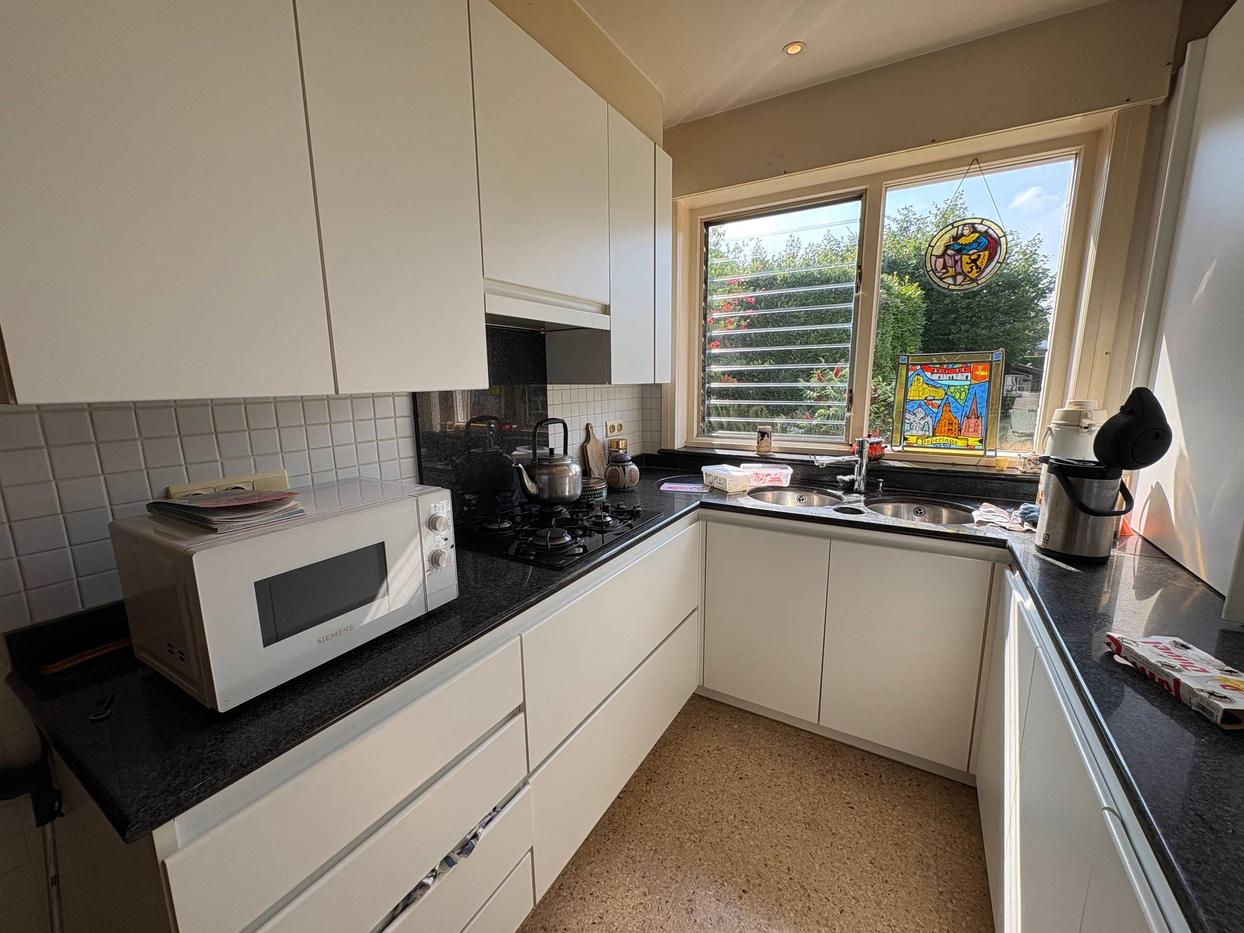 Ruime halfopen gezinswoning met garage en 4 slpk. - foto 4