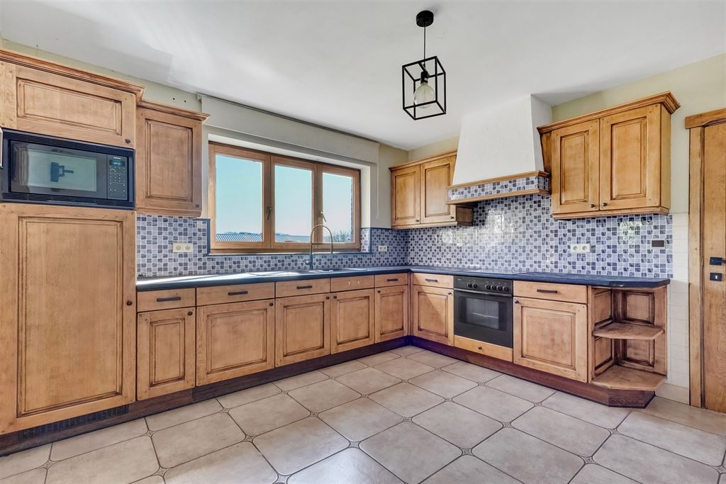 Woning met 22 stallen, binnen- en buitenpiste op 1,6ha in Sint-Truiden - foto 4