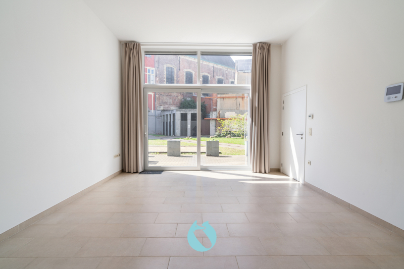 Gelijkvloerse serviceflat met privaat terras - foto 1