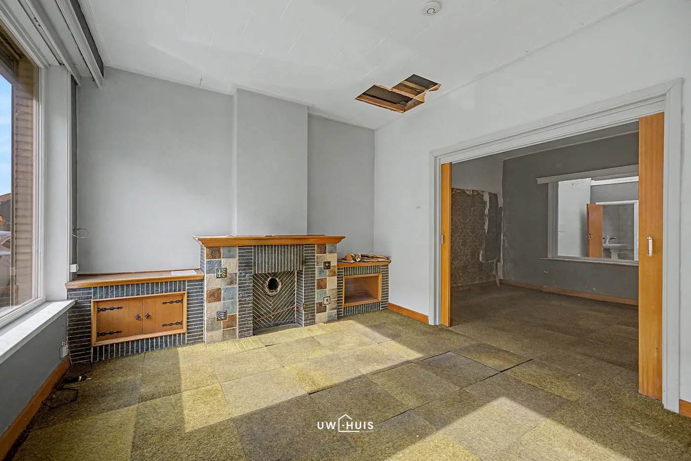 Ruime woning met 3 slaapkamers, garage en tuin – renovatieproject in centrum De Klinge - foto 4