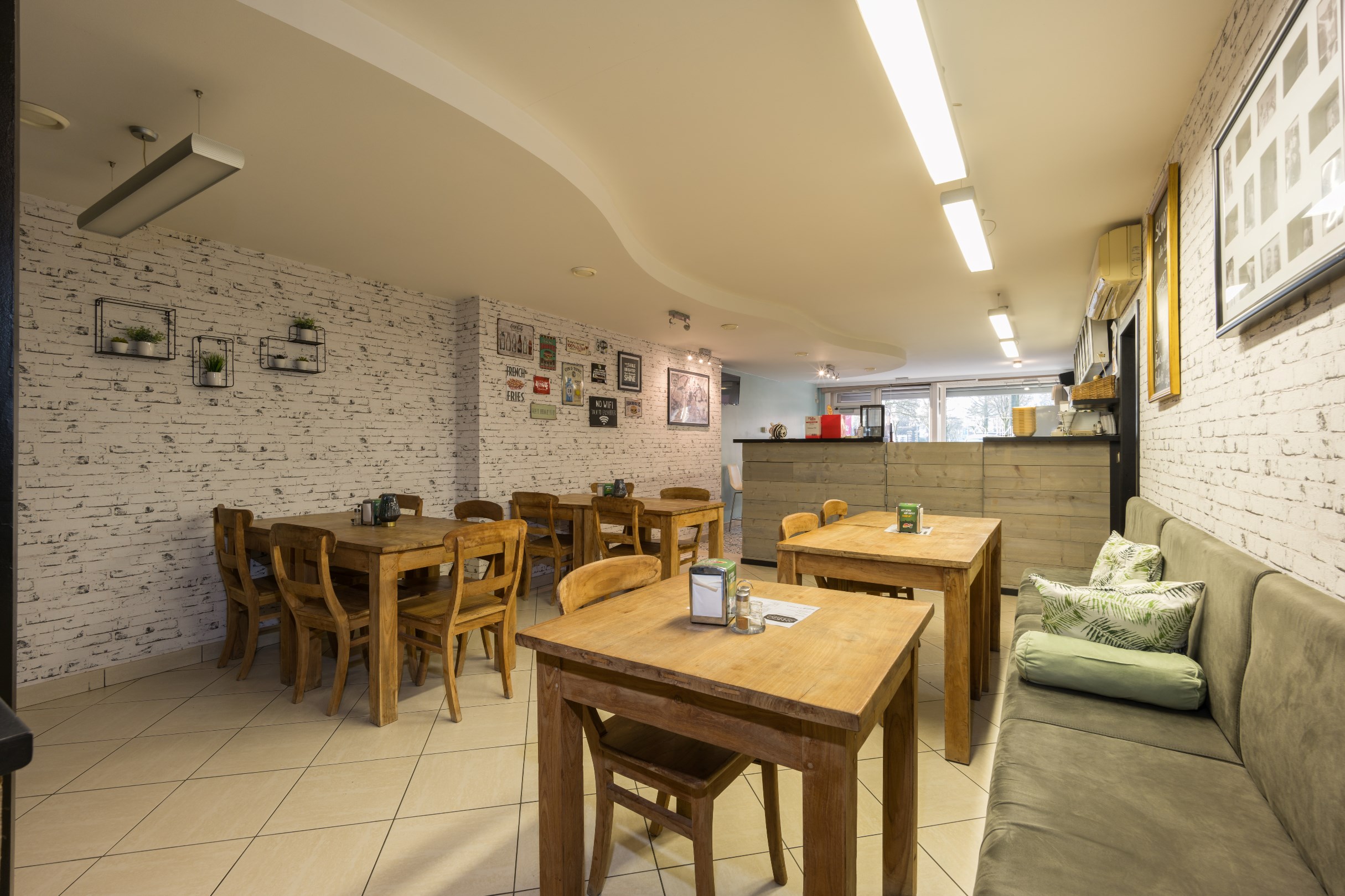 Handelsruimte met 3-slaapkamer appartement in Geel - foto 4