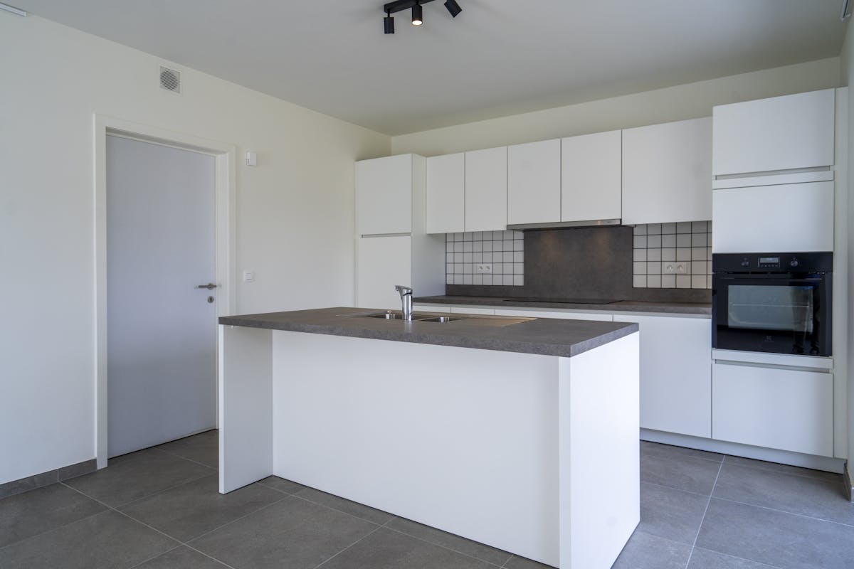 Halfopen nieuwbouwwoning met drie kamers te huur in Harelbeke - foto 5