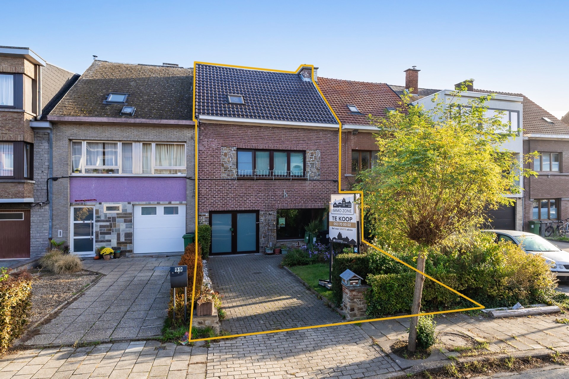 Charmante rijwoning met garage en groene tuin, klaar voor jouw stempel - foto 1