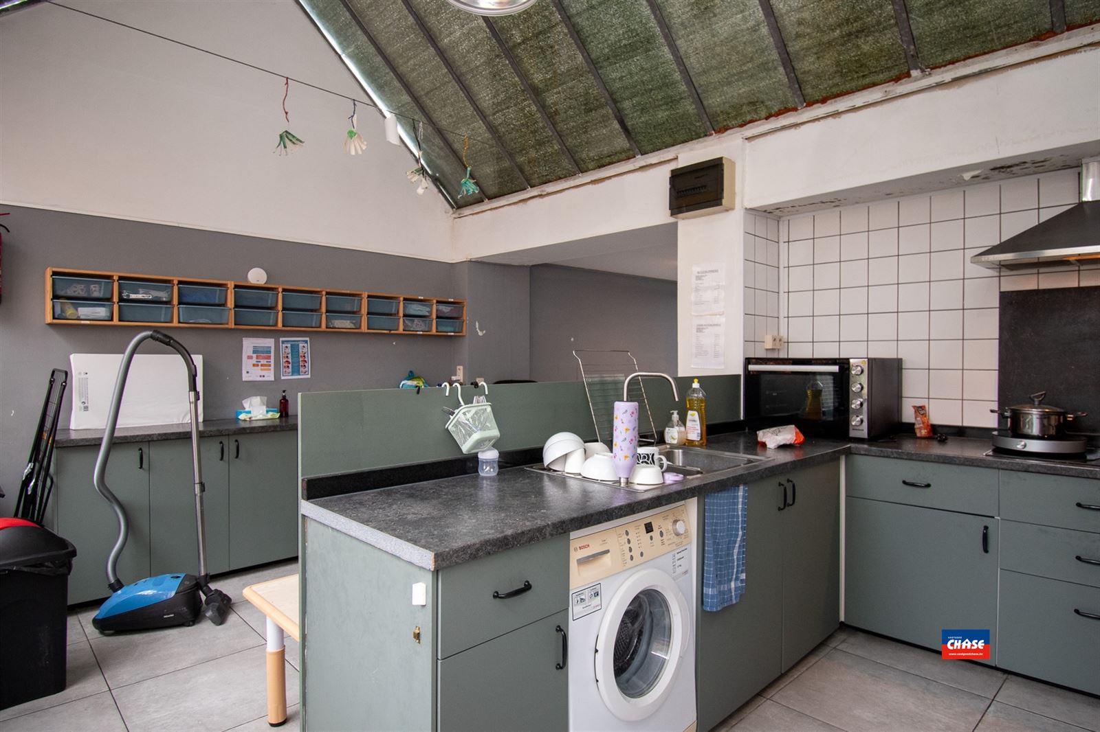 Ruime tweewoonst met mogelijk 9 slaapkamers en tuin - foto 4