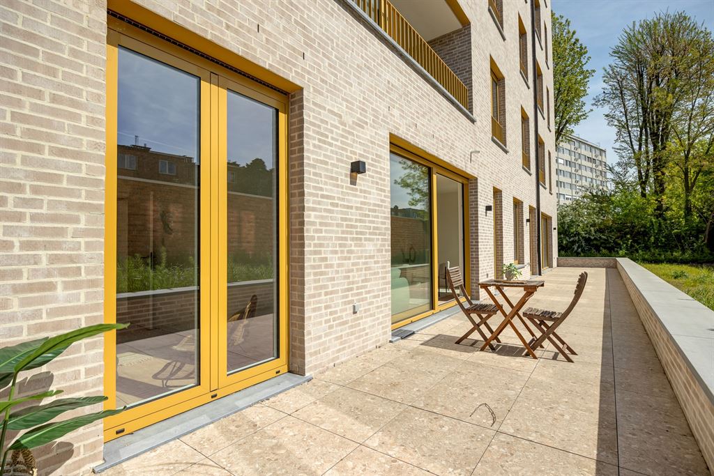 Nieuwbouw gelijkvloersappartement met tuin - foto 3