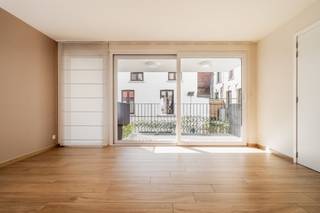 Modern and stylish 1-bedroom apartment with terrace. This first-floor apartment welcomes you into a bright, open living space with a spacious...