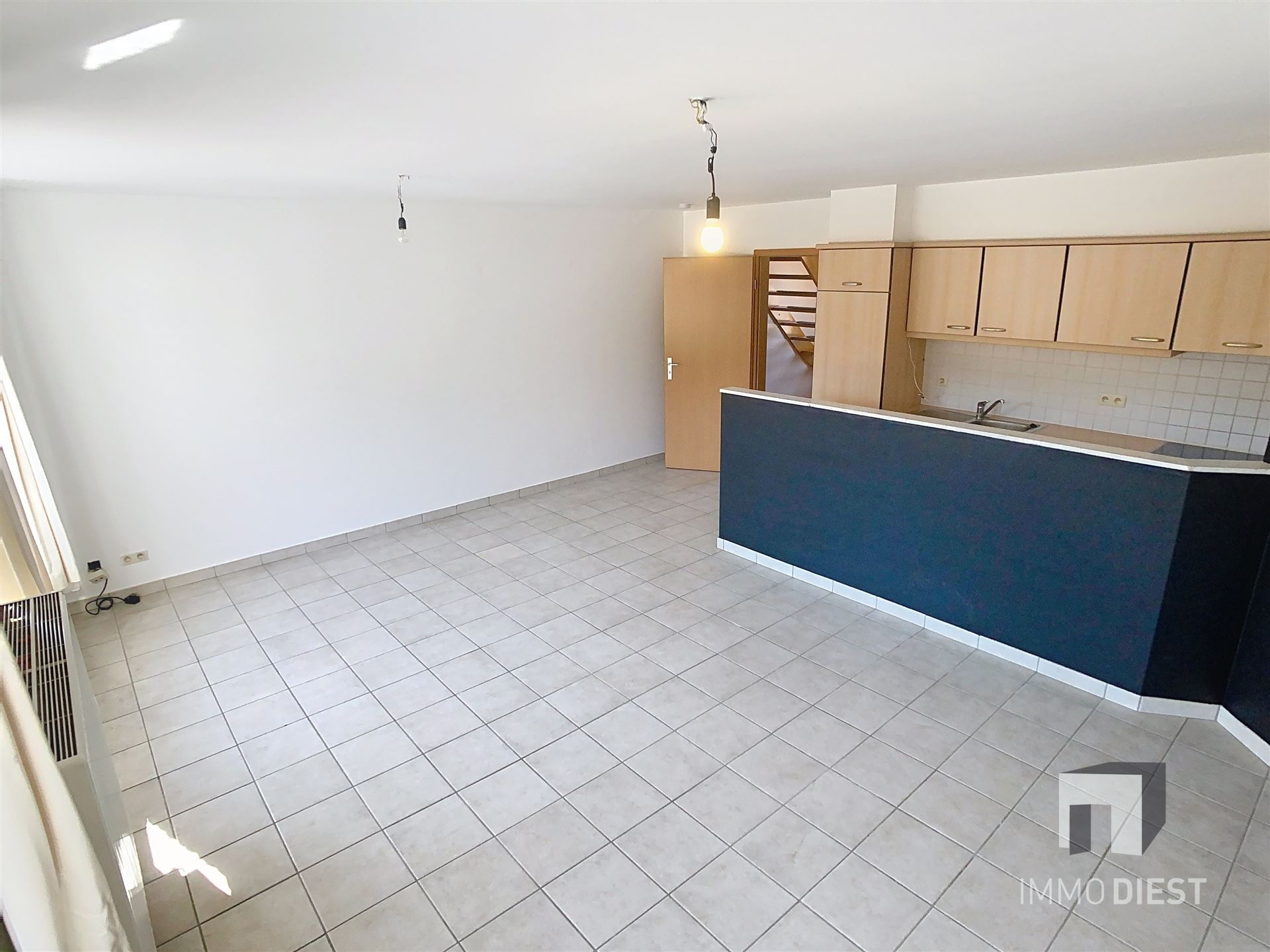 Triplex met 2 slaapkamers en inpandige garage - foto 4