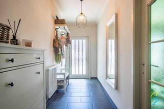 Move-in ready renovated home for sale near the centre of Sint-Lievens-Houtem. This charming property offers all modern comforts and features...