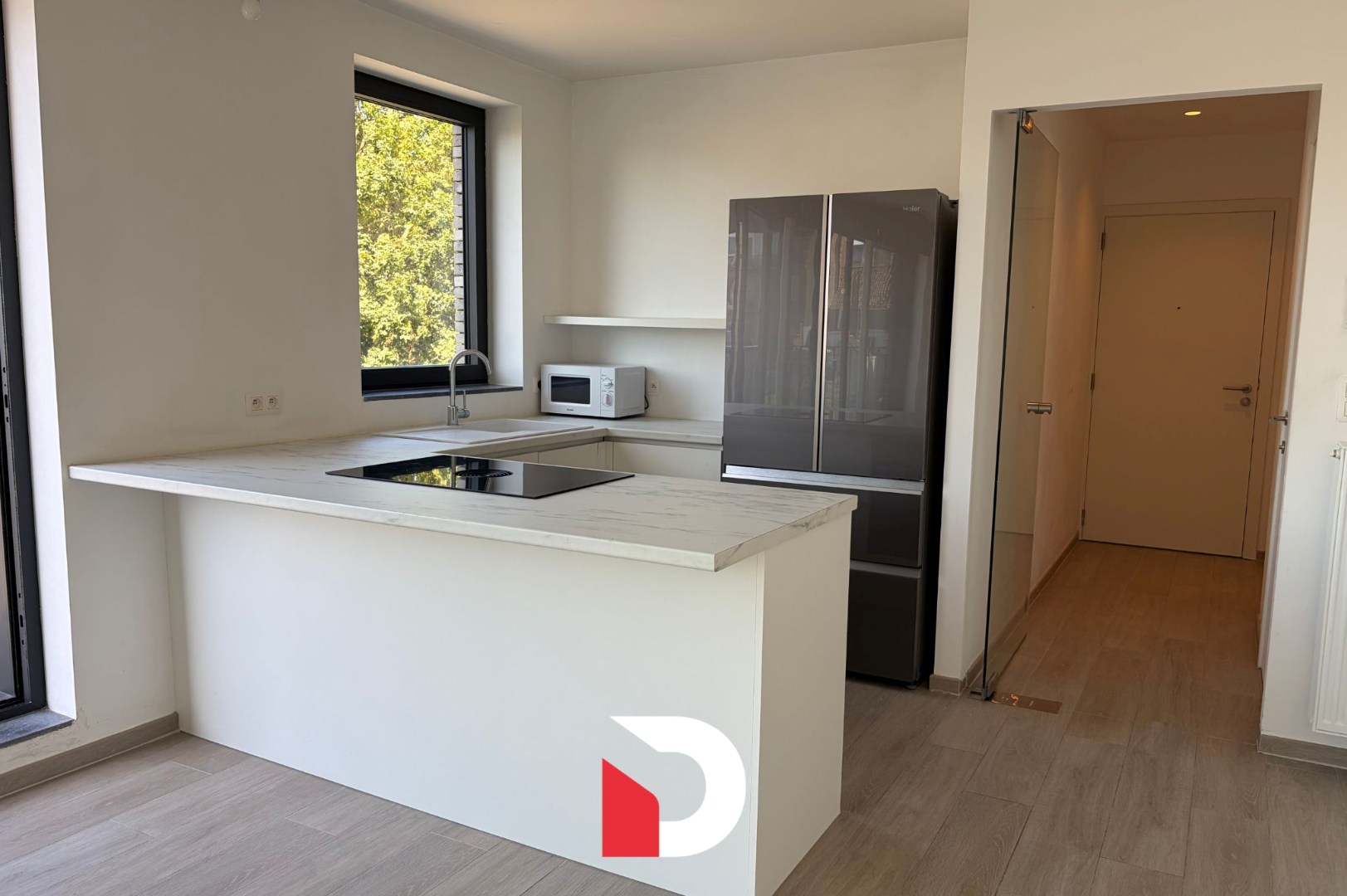 Appartement met 2 slaapkamers, ruim terras en autostaanplaats - foto 5
