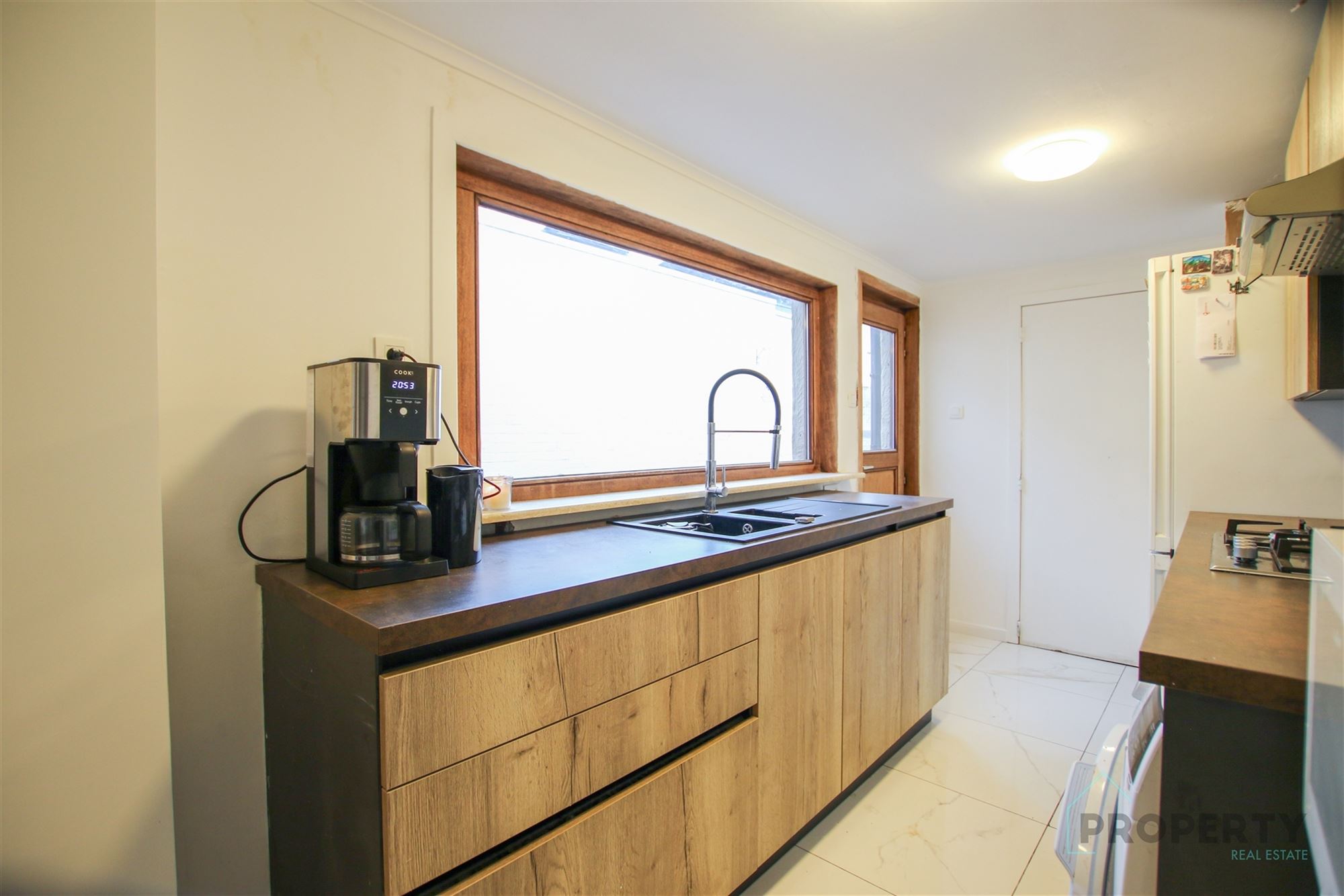 Leuke gezinswoning met stadstuin op centrale ligging - foto 4