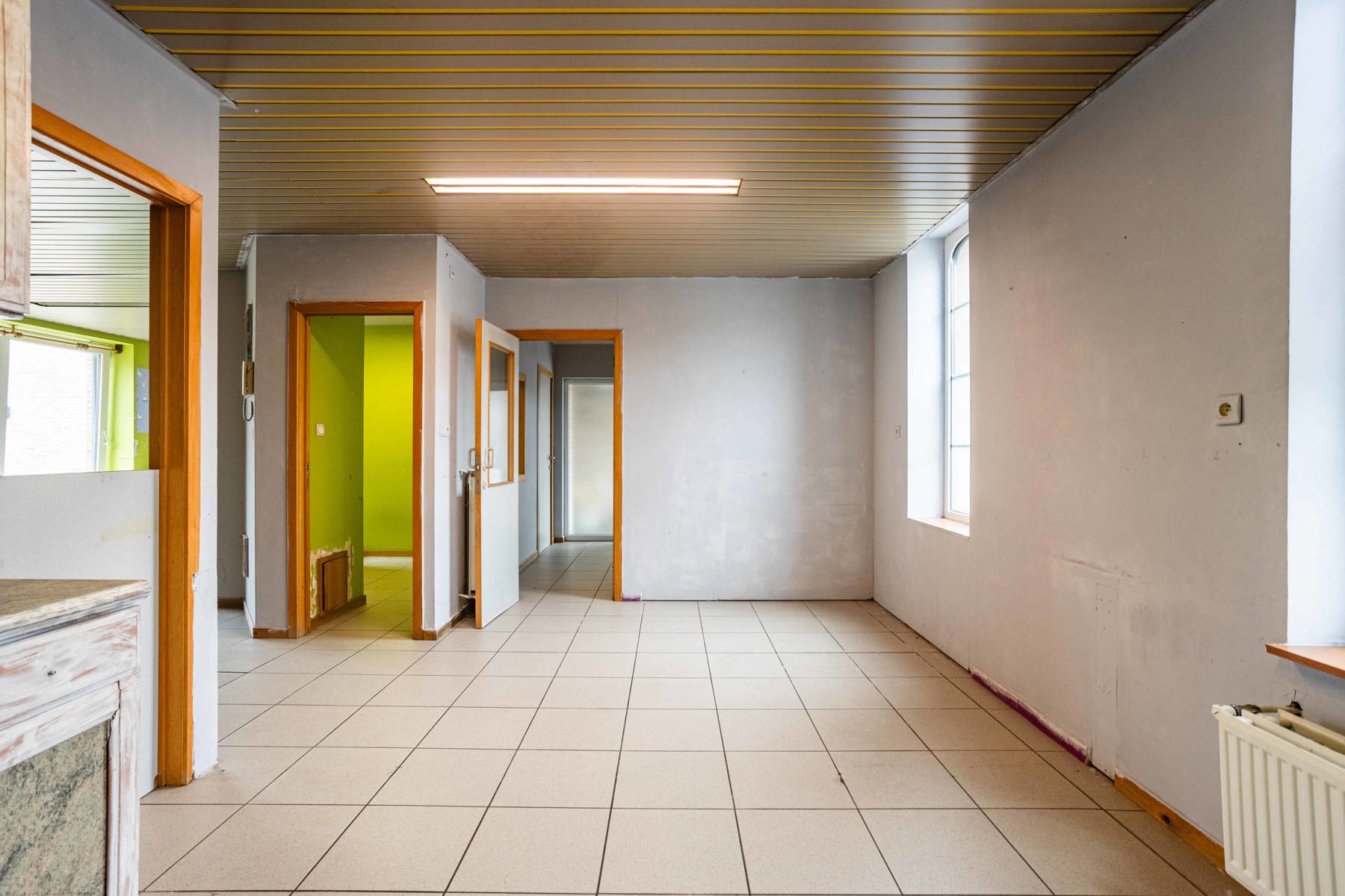 Polyvalente woning met tuin:  momenteel 2 appartementen garage en groot magazijn! - foto 5
