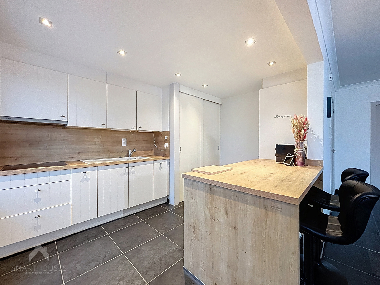 Centraal gelegen appartement met 2 slpks en staanplaats - foto 5