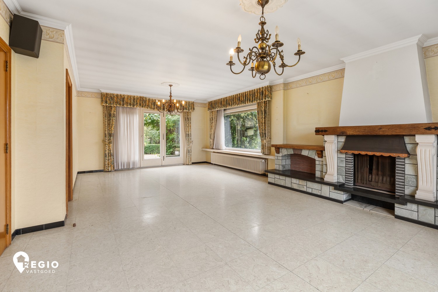 Ruime woning met 3 slaapkamers, garage en een grote tuin op een perceel van 2649 m² - foto 4