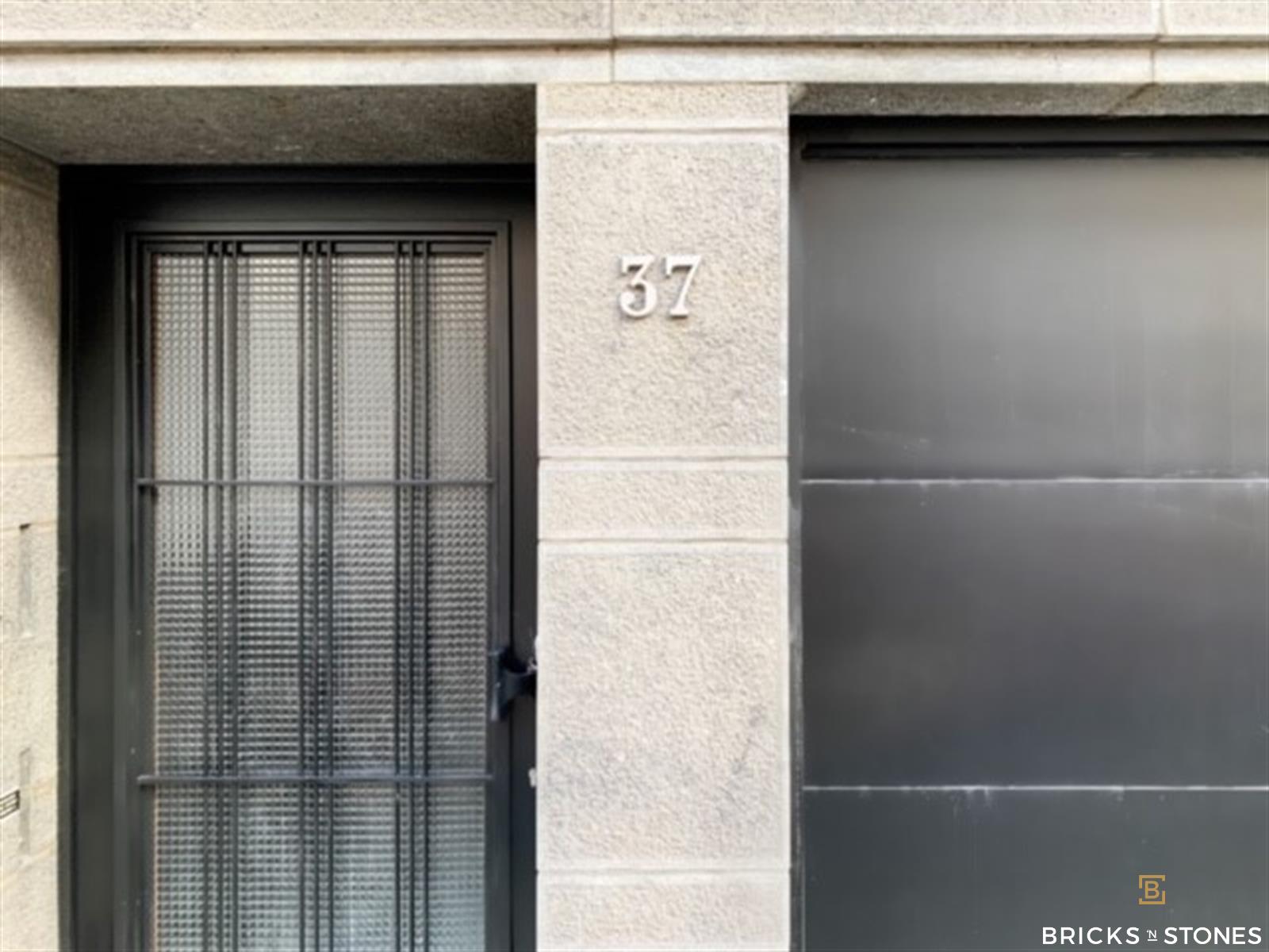 Vergund opbrengsteigendom : 3 app. en 1 polyvalente ruimte - foto 3