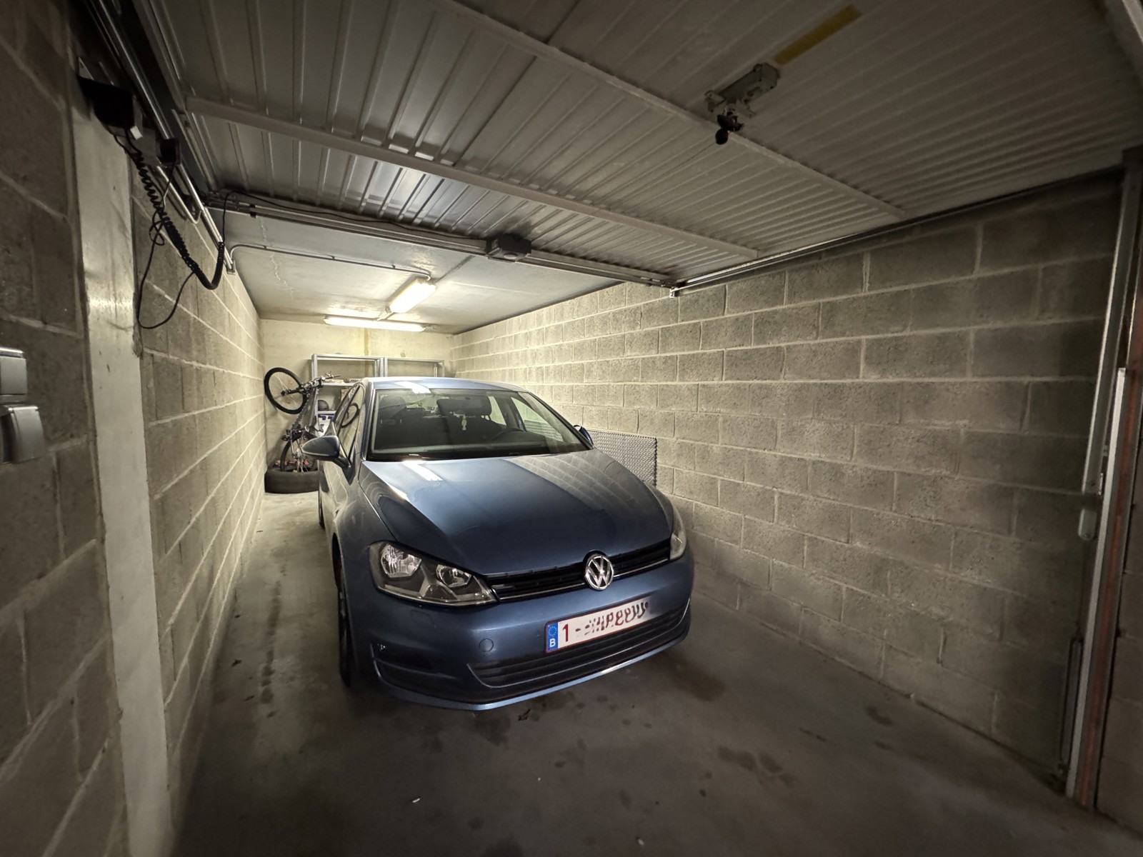Ondergrondse garagebox met sectionale poort - foto 3