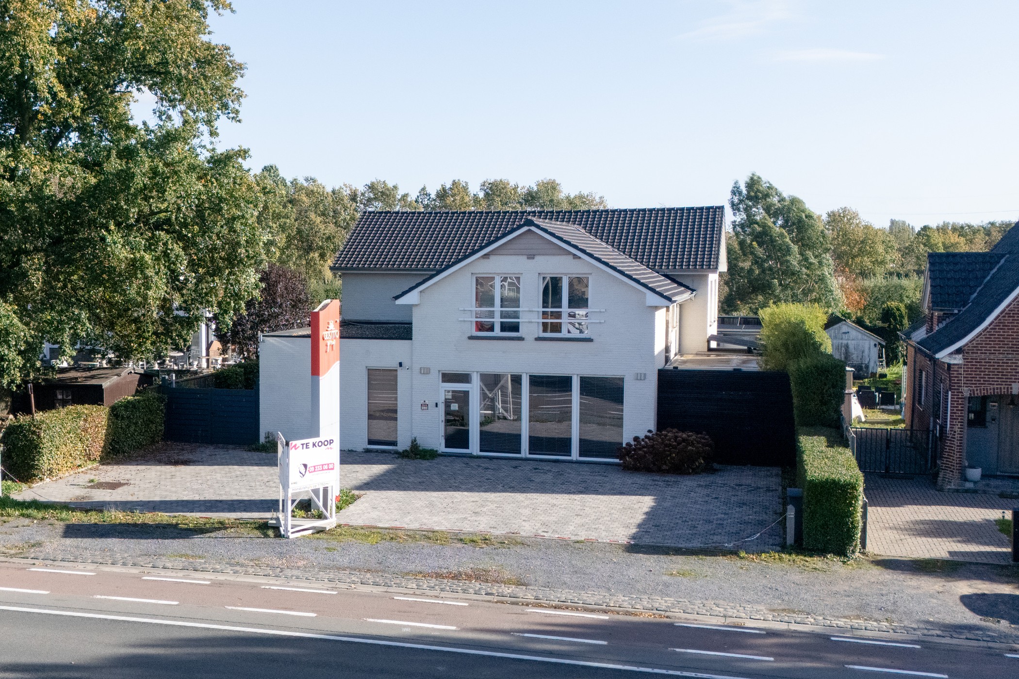 TE KOOP: Handelspand met woonst op perceel van 940 m² - foto 1