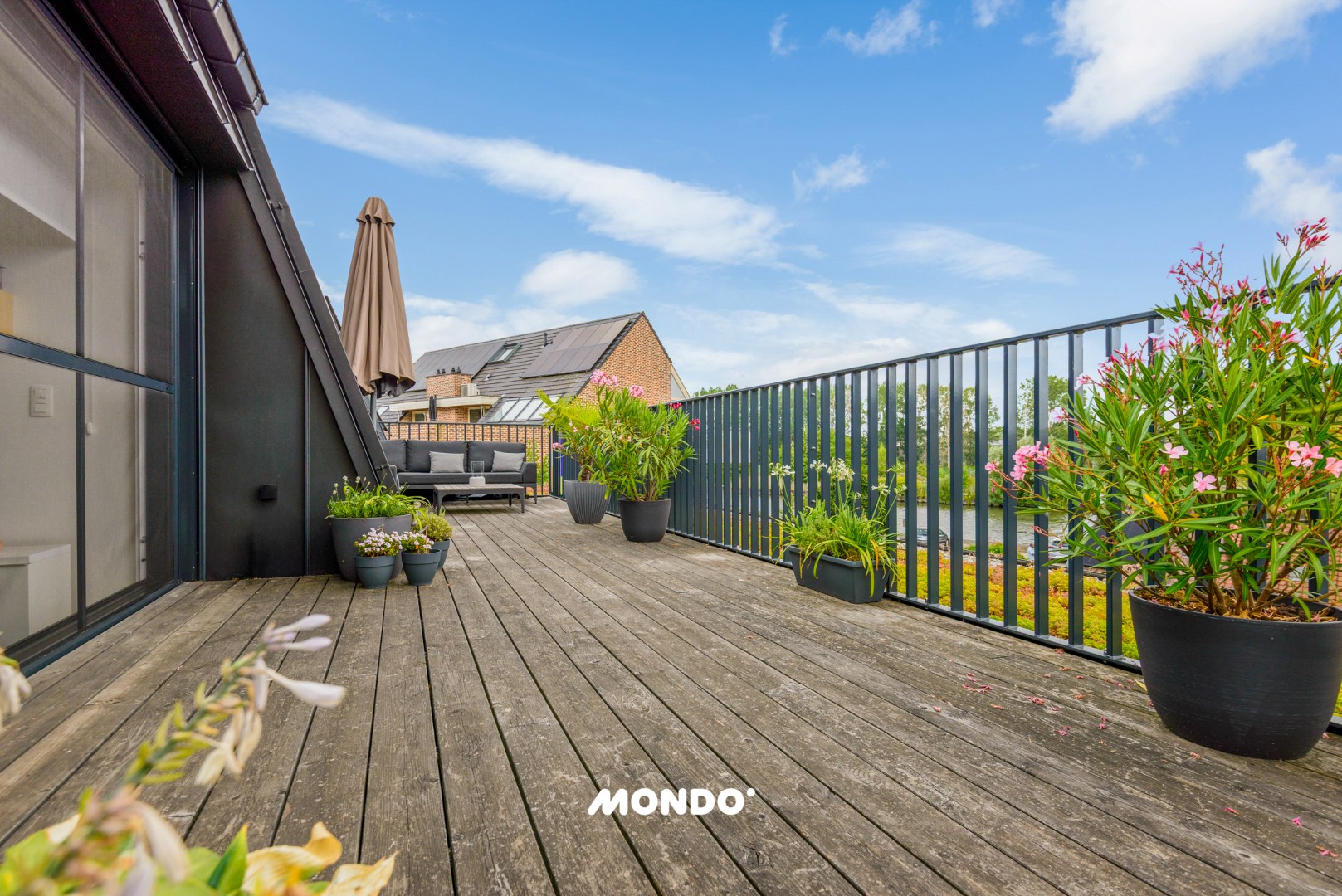 Energiezuinig penthouse met ruim terras, autostaanplaats en zicht op het kanaal - foto 4