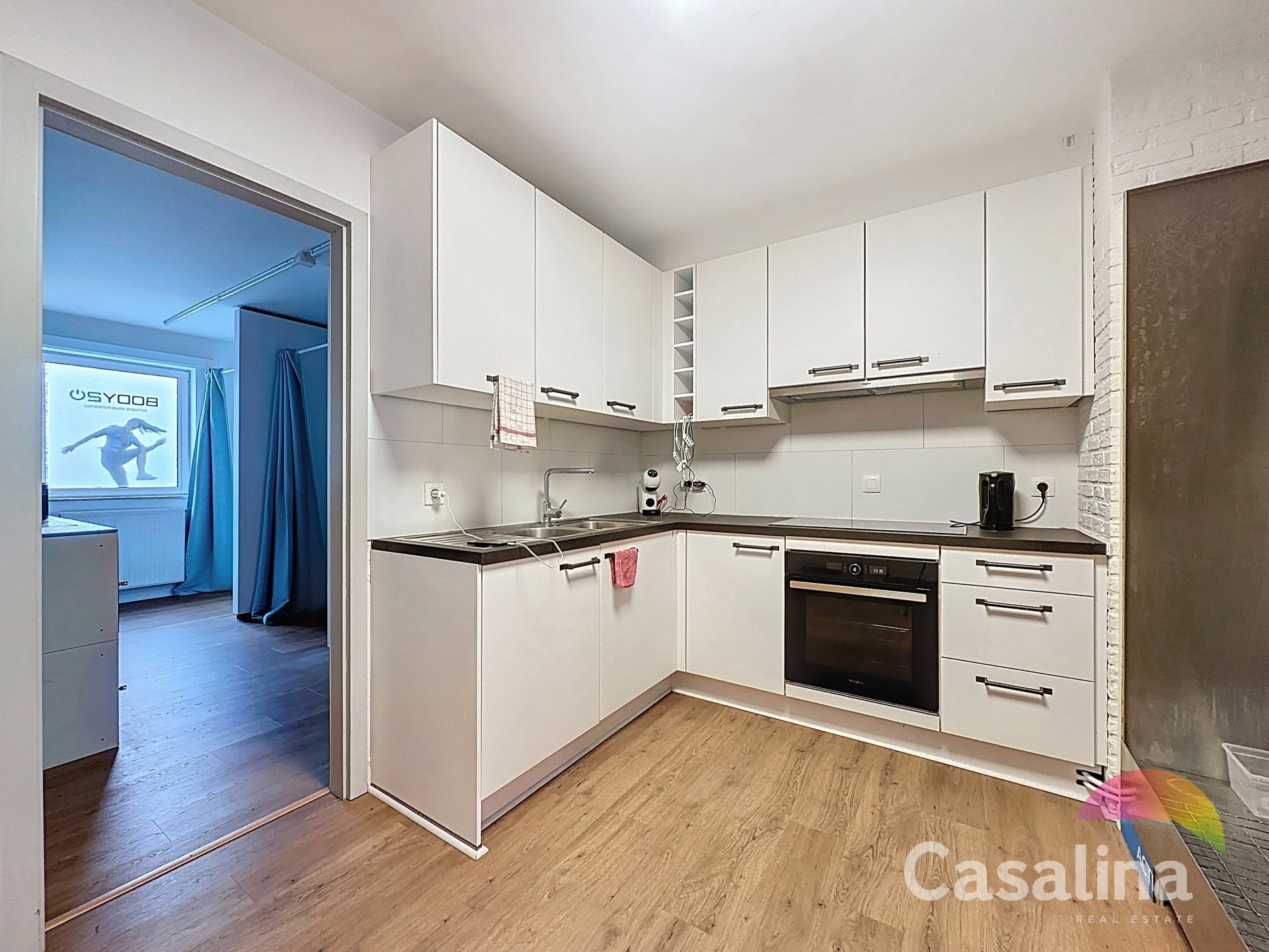 Gemengd gebouw bestaande uit 2 handelsruimtes en 4 woonunits - foto 5