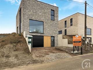 MOGELIJK AAN 6% BTW!!!Deze woning van 264 m² heeft een kelder bestaande uit inkomhal, technische berging, garage, kelder- en tuinberging. Vervolgens...