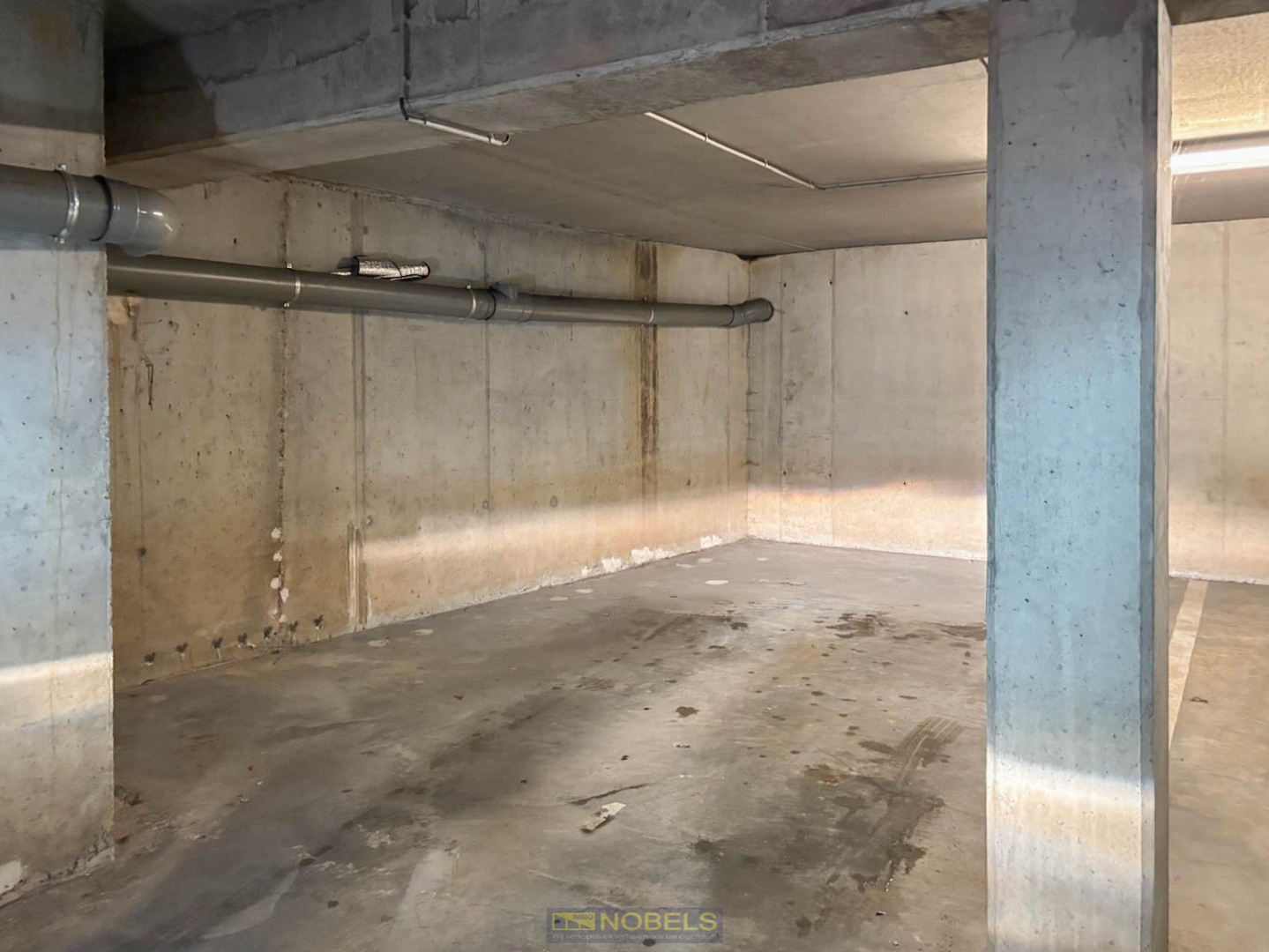 Te koop, ondergrondse staanplaats in appartementsgebouw - foto 2