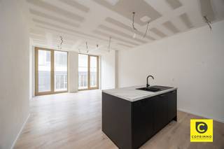 <p><span>Exclusive living at 'The Vault': Modern 1-bedroom apartment in the heart of Antwerp</span></p><p><span>Do you dream of a luxurious home in Antwerp’s vibrant Theaterbuurt neighborhood? Welcome to 'The Vault', an architectural masterpiece designed by Luc Binst. This exclusive new-construction project combines the energy of the city center with the serene tranquility of a quiet side street. Here, you’ll live in a top-tier BEN (Nearly Energy-Neutral) home, where style and sustainability go hand in hand. Everything Antwerp has to offer is right at your doorstep: from the luxurious boutiques on Schuttershofstraat and the Meir to world-class cuisine at the nearby Botanic Sanctuary. Culture lovers will be in their element with the Bourla Theater and the City Park within walking distance.</span></p><p><span> </span></p><p><span>Bright living space &, open kitchen</span></p><p><span>As soon as you walk in, you’ll immediately sense the high-quality character of this approximately 57 m² apartment. Thanks to the floor-to-ceiling windows, the living space is bathed in natural light, creating a wonderfully open and airy feel. The open kitchen is seamlessly integrated into the space and finished with high-quality materials. Whether you’re starting your day with breakfast or hosting friends for dinner, the space exudes class and comfort.</span></p><p><span> </span></p><p><span>Terrace</span></p><p><span>A major highlight is the covered terrace of approximately 5 m², the perfect spot to enjoy a cup of coffee or a good book in complete privacy.</span></p><p><span> </span></p><p><span> & -Style Bedroom</span></p><p><span>The bedroom is an oasis of tranquility, finished with an eye for detail. The bathroom features modern fixtures, including a walk-in shower and a stylish vanity unit. Additionally, the apartment includes a practical storage closet, ensuring a tidy interior. Thanks to Type D ventilation, you’ll always enjoy a healthy indoor climate.</span></p><p><span> </span></p><p><span>Top-Level Sustainability</span></p><p><span>This apartment was built with the future in mind. With an energy rating of 20 or lower, the home is officially BEN (Nearly Energy Neutral). The integration of solar panels not only supports a sustainable lifestyle but also results in significantly lower energy bills.</span></p><p><span> </span></p><p><span>Rent, fees & availability</span></p><p><span>Rent: €975/month </span></p><p><span>Common area fees: €75/month (maintenance of common areas)</span></p><p><span>Security deposit: one-time payment of €250</span></p><p><span>Available: Immediately</span></p><p><span> </span></p><p><span>Key features at a glance:</span></p><p><span>- Architectural class: Designed by the renowned Luc Binst.</span></p><p><span>- Extremely energy-efficient: BEN-certified home (E20 or lower) including solar panels.</span></p><p><span>- Prime location: Situated in the heart of the Theaterbuurt neighborhood, near the Botanic Sanctuary and the Meir.</span></p><p><span>- Move-in ready: High-quality finishes with plenty of natural light thanks to generous windows.</span></p><p><span>- Outdoor living: Covered terrace of approx. 5 m²</span></p>