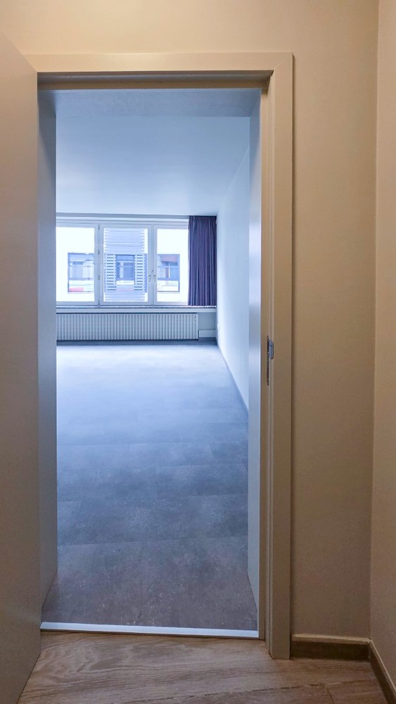 DUPLEX APPARTEMENT MET 2 SLAAPKAMERS EN TERRAS - foto 4