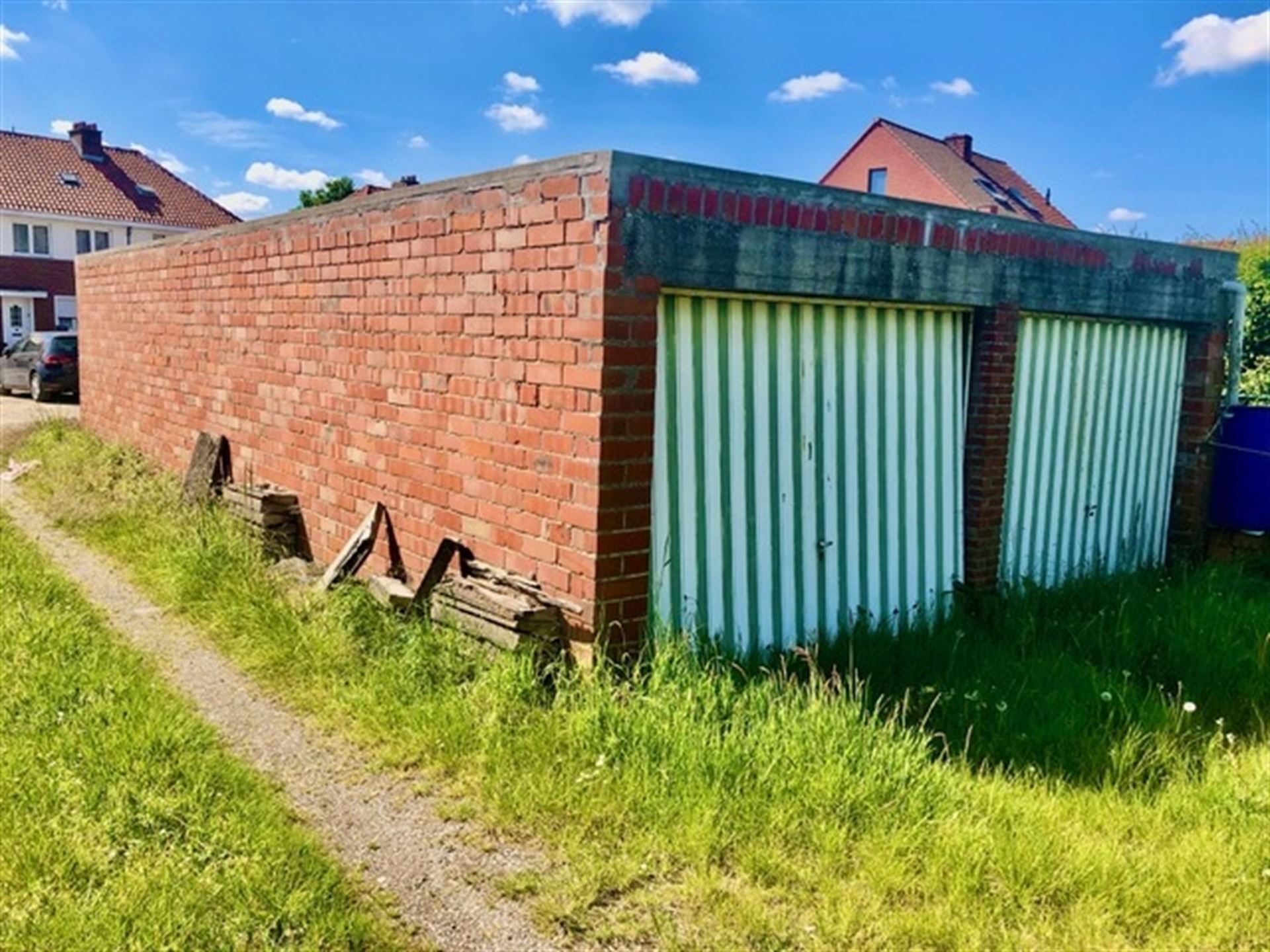 Bouwgrond met 11 garages - foto 5