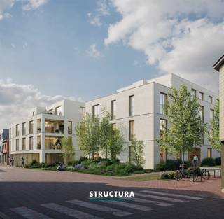 Bienvenue à Hof Ten Anker, votre nouveau port d’attache. Hof Ten Anker compte 20 unités résidentielles spacieuses, réparties sur deux bâtiments à taille humaine de quatre étages chacun, avec un penthouse individuel au dernier niveau.Les appartements comprennent 2 ou 3 chambres et bénéficient de surfaces généreuses allant d’environ 90 à 165 m². Des terrasses spacieuses ne sont pas ici une exception, mais bien la règle pour chaque appartement. De plus, elles profitent non seulement d’une orientation optimale, mais aussi d’une vue imprenable sur l’espace vert central. Les appartements du rez-de-chaussée disposent en outre d’un jardin privatif convivial. Pour ceux qui rêvent plutôt d’une maison, une habitation semi-ouverte est également disponible, avec un jardin orienté sud-ouest, idéale pour combiner le confort d’une maison avec les avantages de la vie en centre-ville. Au sous-sol, un parking commun est prévu, avec bornes de recharge en option et une cave privée pour chaque logement.Les cyclistes disposent d’un vaste local à vélos, tant en surface qu’en sous-sol, avec des connexions possibles pour vélos électriques.