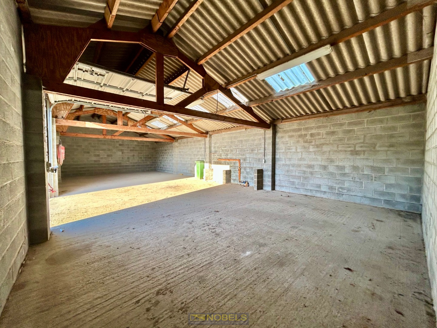 Te huur, opslagterrein (+/- 1.100 m²) met 2 loodsen te Kluisbergen - foto 5