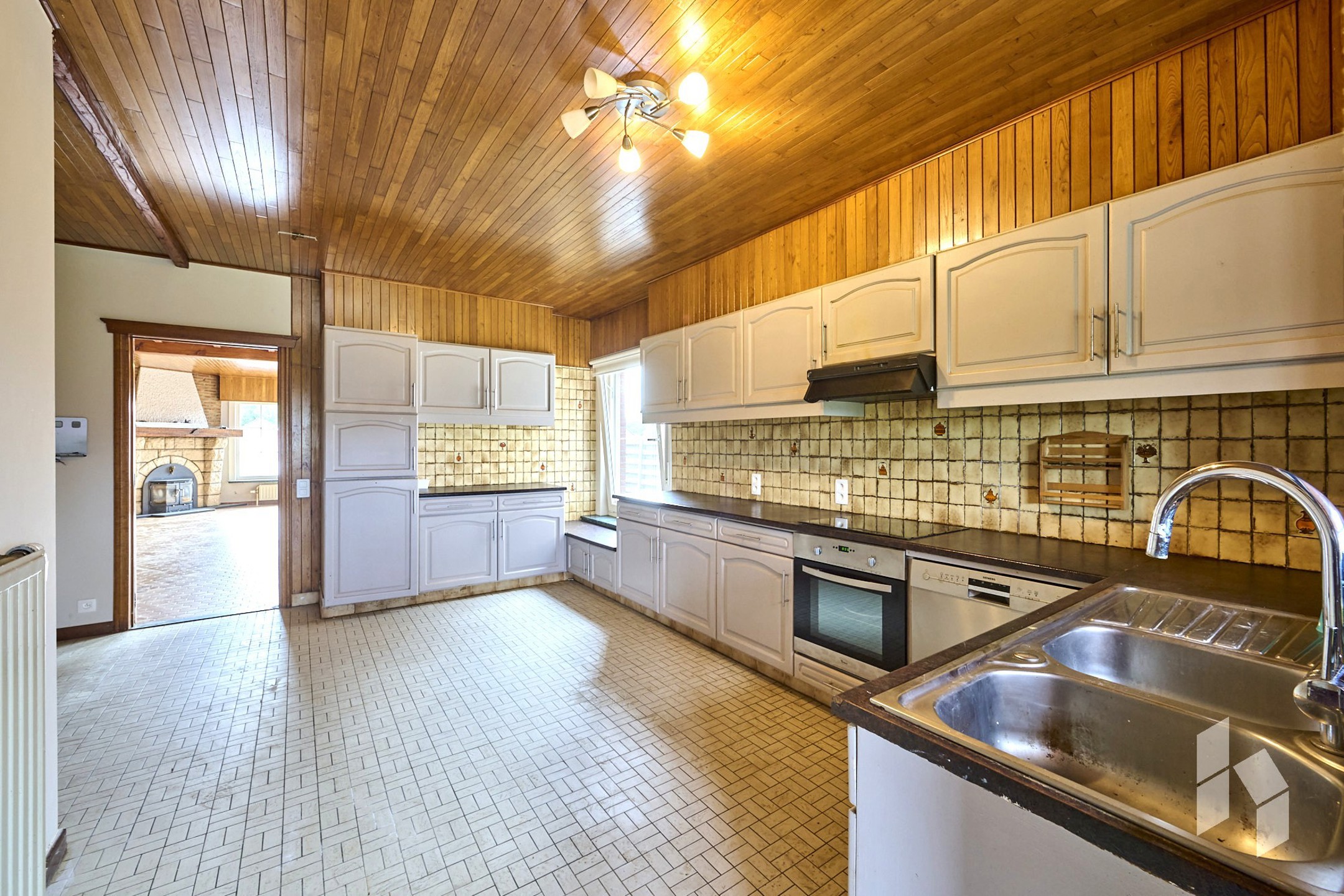 Ruime gelijkvloerse woning met 3 slpks op perceel van 774m². - foto 5