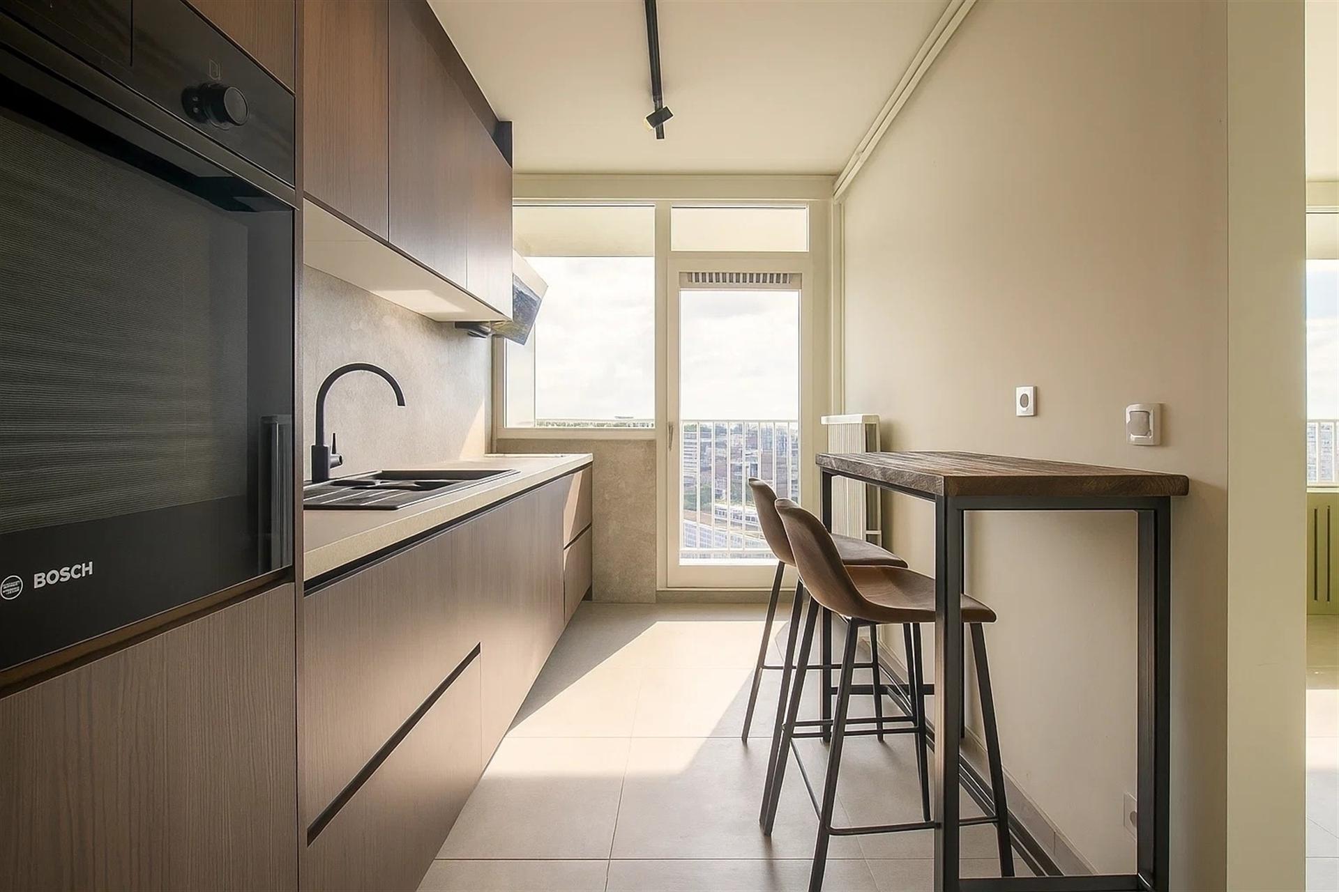 Gerenoveerd appartement met panoramisch zicht op Gent. - foto 5