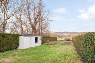 Stylishly renovated farmhouse, comprising on the ground floor an entrance hall, living room with open wood-burning cassette, dining room,...