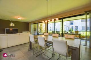 <p><span>Spacious ground floor apartment with 2 bedrooms in Halen</span></p><p><span> </span></p><p><span>In an excellent location at Begijnhofplein 5, you will discover this beautiful ground floor apartment, where space, light and comfort come together. Thanks to its well thought-out layout, high-quality finish and energy-efficient features, this apartment is an ideal home for those who want carefree and pleasant living.</span></p><p><span> </span></p><p><span>Upon entering the apartment, you are immediately welcomed into a bright living space with an open and inviting character. The kitchen, with separate storage room, seamlessly connects to the dining room, creating a beautiful whole where coziness and functionality are key. </span></p><p><span> </span></p><p><span>The night hall takes you to the 2 bedrooms, the bathroom with double sink & generous walk-in shower &and a separate toilet. The bedrooms have spacious areas, which only enhances the feeling of comfort and living quality.</span></p><p><span> </span></p><p><span>In terms of outdoor space, this apartment also has a lot to offer. You enjoy two spacious terraces, each with their own assets. The first terrace connects nicely to the living space and is the perfect place to unwind. The second terrace is accessible from both bedrooms, providing additional comfort and a pleasant connection between the bedrooms and the outdoors.</span></p><p><span> </span></p><p><span>Furthermore, an underground car parking space and a private storage room complete the property. </span></p><p><span> </span></p><p><span>Interested in a visit? Contact us today!</span></p><p><span> </span></p><p><span>015 20 36 00 - <span>info@domoxim.be</span></span><span> </span></p><p><span> </span></p><p><span>domoXim. Where dreams, come home!</span></p><p><span> </span></p><p><span>Also want to know the value of your </span><span>own home</span><span>? We are happy to give you advice.</span></p>