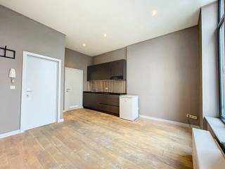 LIGGING:Deze studio is gelegen op de eerste verdieping van een kleinschalige residentie in het hart van Gent met uitzicht op het water. Het pand...