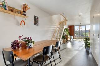 The living space connects seamlessly to the spacious terrace, providing plenty of light. The open kitchen is practically furnished and perfect...