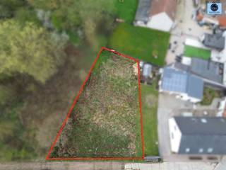 <p><span>QUIETLY LOCATED LOT FOR NEW CONSTRUCTION</span></p><p><span>Asking Price: 149,000 euros</span></p><p><span> </span></p><p><span>This well-located lot for open-plan development, with an area of 5a39, is situated in a picturesque village near the church and village center.</span></p><p><span>The street width is approximately 23.75 meters, and the lot depth is approximately 34 meters. </span></p><p><span> </span></p><p><span>If you love peace and quiet, this is definitely the place for you.</span></p><p><span> </span></p><p><span>Connection costs for utilities are the responsibility of the buyer.</span></p><p><span> </span></p><p><span>All information is available at the office.</span></p><p><span> </span></p><p><span> </span></p><p><span>For more information or to schedule a visit, call 0475/51.40.73 or send an email to sven@svena.be. For more information, visit www.svena.be</span></p><p><span> </span></p><p><span>This information is provided for informational purposes only, and we cannot be held liable for any inaccuracies.</span></p><p><span>The living area is for reference only.</span></p>
