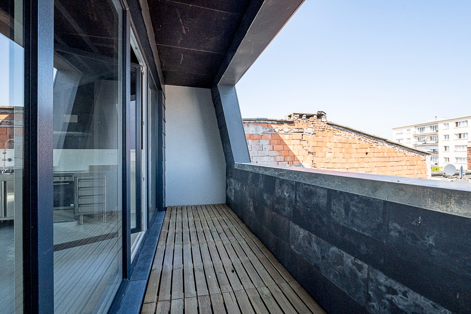 Genieten op hoogte: lichtrijk dakappartement met terras - foto 5